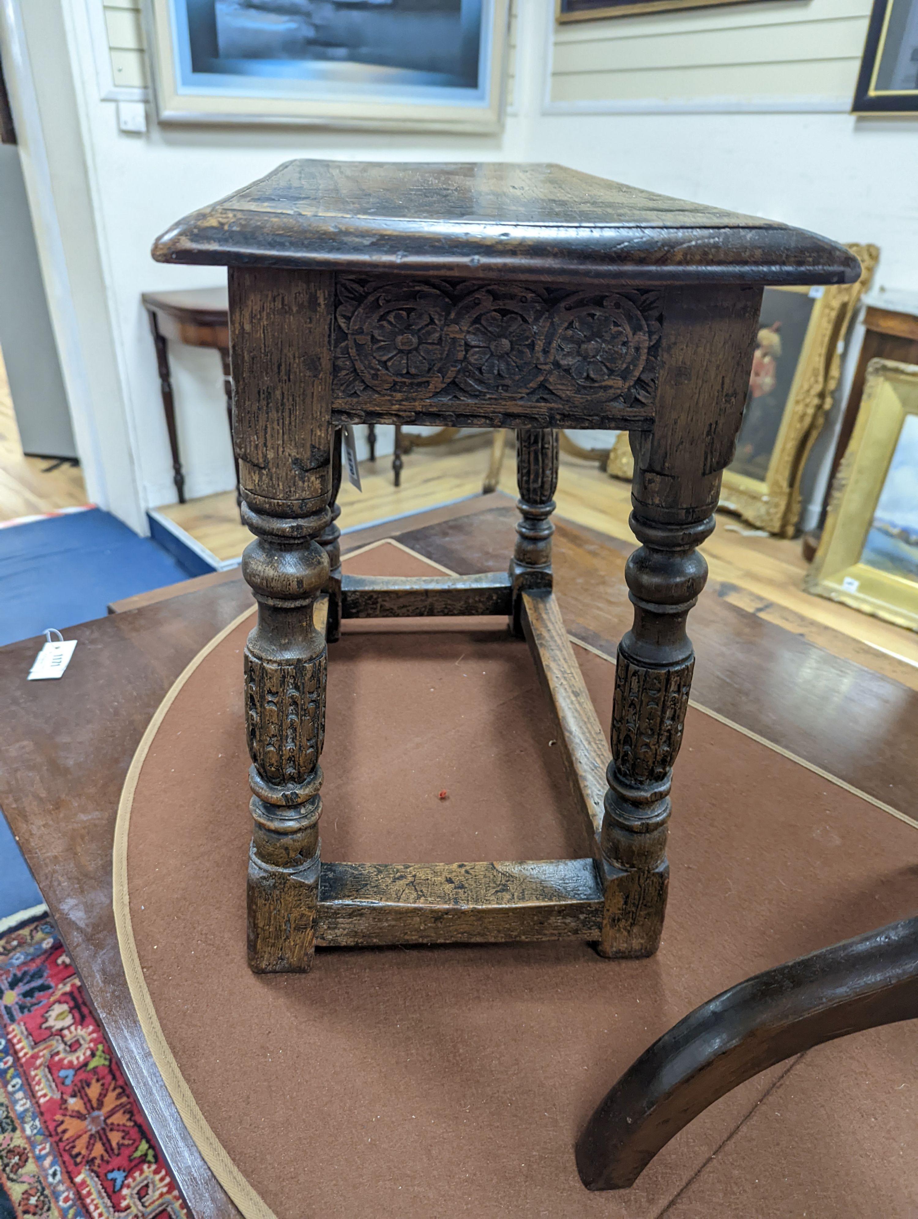 A 17th century style rectangular oak joint stool, width 56cm, depth 28cm, height 47cm